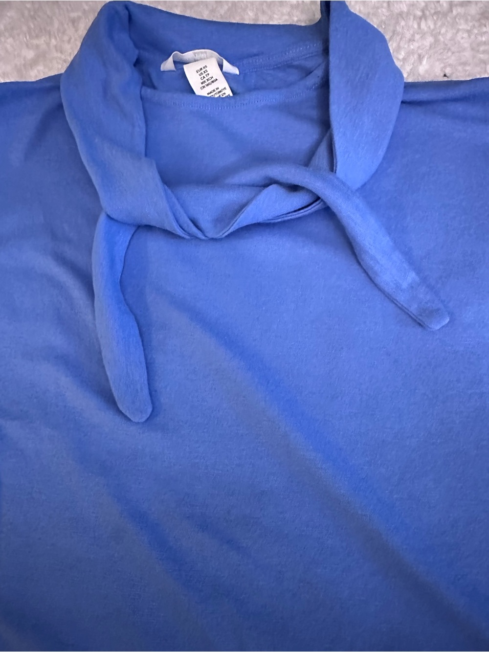 Blue shirt with attached neck scarf